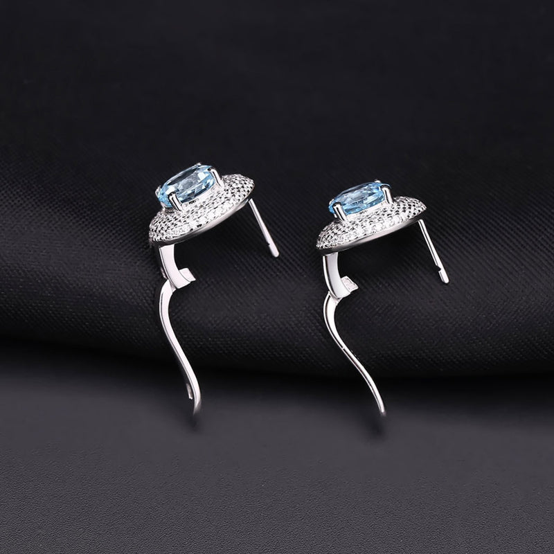 Opulent Blue Topaz Halo Clear Cubic Zirconia Cluster Stud Earrings